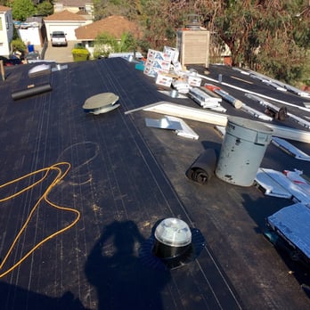 Gibson's Roofing - Day 3 Wednesday, tar paper underlayment and new skylights installed. - Roofing Near Me - Torrance, California