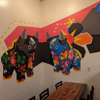Picante - Seating area with great murals - Peruvian Near Me - Ontario, California Picante - Seating area with great murals - Peruvian Near Me - Ontario, California