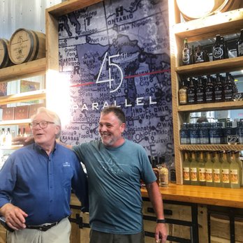 45th Parallel Distillery - Founder Paul on the right and awesome tour master Steve on the left. - Pizza Near Me - New Richmond, Wisconsin