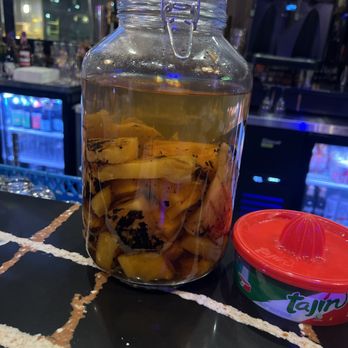 Catrina’s Tacos & Tequila - Infused Tequila for pineapple habanero margaritas! - Mexican Near Me - Charleston, South Carolina
