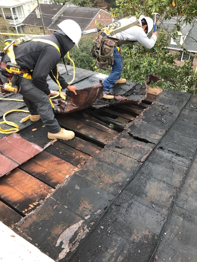 Slide of Canaan roofing and gutters