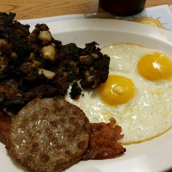Reubens - Eggs and homefries part of the breakfast sampler. - Breakfast & Brunch Near Me - Palm City, Florida