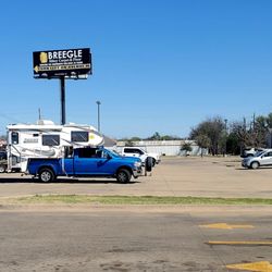 Chicken Express - Parking lot next to building