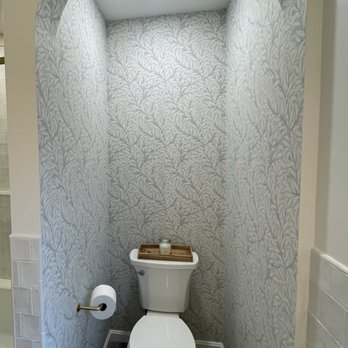 Joy Lewis Design - Joy's idea to create an arch and add wallpaper in the toilet room - Interior Design Near Me