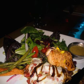 Enchanted Forest - This is half salmon from my friend we halved our meal with each other and a half portobello stuffed mushroom. - Salad Near Me - Placerville, California