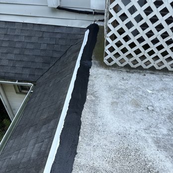 Poulterer Family Roofing - The patch and new edge that keeps the water from running under the shingles....this has been missing for years. - Roofing Near Me Poulterer Family Roofing - The patch and new edge that keeps the water from running under the shingles....this has been missing for years. - Roofing Near Me