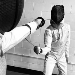 East Coast Fencing Club - Fencing drills, two students working on a specific action.