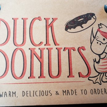 Duck Donuts - Store box: notice the corner vent holes, as the donuts are warm when served . . . - Donuts Near Me - Hauppauge, New York Duck Donuts - Store box: notice the corner vent holes, as the donuts are warm when served . . . - Donuts Near Me - Hauppauge, New York