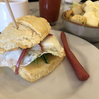 The Baker’s Table - Egg Sammy on a biscuit... love the pickled onions on this - New American Near Me - Newport, Kentucky