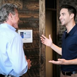 Alarm New England - Talking to a customer about the benefits of the Honeywell Lyric Controller, the central hub of our smart home security system.