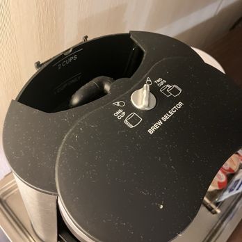 Hilton Jackson - Coffee machine with missing lid and covered in dust. - Hotels Near Me - Jackson, Mississippi