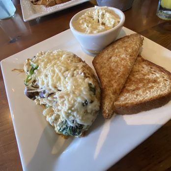 Surfside Rooster - Veggie omelette and grits - American Near Me - Ocean City, Maryland Surfside Rooster - Veggie omelette and grits - American Near Me - Ocean City, Maryland