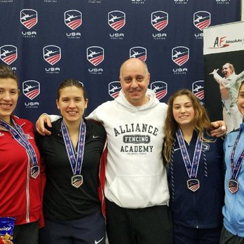 Alliance Fencing Academy - Olympians Kelley and Courtney Hurley smile with their Alliance Teammates Giana Vierheller and Barbara VanBenthuysen after Top 8 finishes. - Fencing Clubs Near Me - Houston, Texas Alliance Fencing Academy - Olympians Kelley and Courtney Hurley smile with their Alliance Teammates Giana Vierheller and Barbara VanBenthuysen after Top 8 finishes. - Fencing Clubs Near Me - Houston, Texas