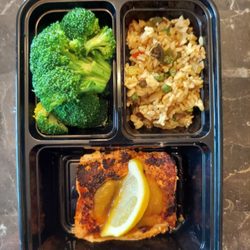 D & M Grille - Pan seared salmon filet, steamed broccoli, organic basmati fried vegetable rice.