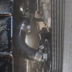 McKenzie's Auto & Truck Repair - The hose that they replaced that blew off due to clamps bot being tightened
