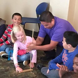 Lakeshore Museum Center - Kids learning how to make fire