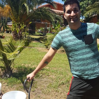 Rancho Zaragoza - fiance pulling the cart and the parrots and chickens in the background - Farmers Market Near Me - Brentwood, California Rancho Zaragoza - fiance pulling the cart and the parrots and chickens in the background - Farmers Market Near Me - Brentwood, California