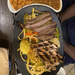 Chevys Fresh Mex - Mixed fajitas with chicken and steak and the standard condiments