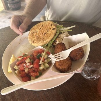 Carvor's Fish House - Grouper sandwich, hush puppies and Greek salad - Seafood Near Me - Dunedin, Florida Carvor's Fish House - Grouper sandwich, hush puppies and Greek salad - Seafood Near Me - Dunedin, Florida