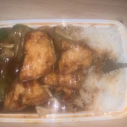a bowl of chicken and rice a bowl of chicken and rice
