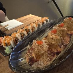 Dozo - Spicy crunchy salmon roll (left), volcano roll (right)