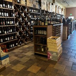 Cuvino Trattoria Pizza Enoteca - Wine wall in the restaurant.