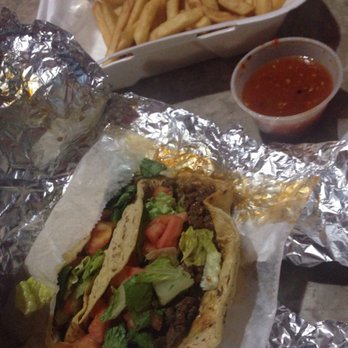 Manjares Restaurant - Tacos de asada comes w lettuce and tomato - New American Near Me - Chicago, Illinois