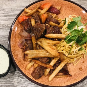 District 5 - Saltado shaken fries w/ garlic noodles& fillet mignon - Noodles Near Me - Lake Forest, California