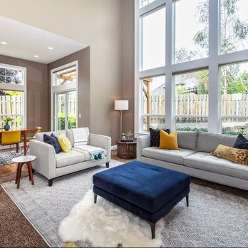 Portland Design Group - Staged living room in grey with blue and yellow accents. - Home Staging Near Me Portland Design Group - Staged living room in grey with blue and yellow accents. - Home Staging Near Me