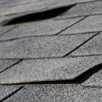 Ace GC Exteriors - a closeup of a shingled roof - General Contractors Near Me Ace GC Exteriors - a closeup of a shingled roof - General Contractors Near Me