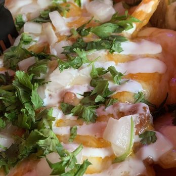 Sancho’s Tacos - NOT CHO FRIES (French fries, onions, cilantro, beans, sour cream, and LOTS of melted cheddar-jack cheese) - Breakfast & Brunch Near Me - Oceanside, California Sancho’s Tacos - NOT CHO FRIES (French fries, onions, cilantro, beans, sour cream, and LOTS of melted cheddar-jack cheese) - Breakfast & Brunch Near Me - Oceanside, California