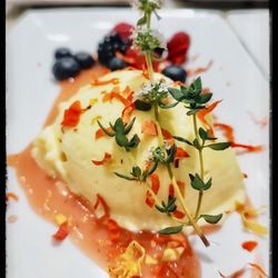 Private Chef William Bloomhuff - Scratch made, fresh Thyme (from Chef's garden) and Meyer Lemon ice cream. The colorful nasturtium flowers add exciting color to the dish!
