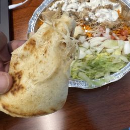 Dried hair-like chicken strands stuck on the pita bread. Disgusting af Dried hair-like chicken strands stuck on the pita bread. Disgusting af