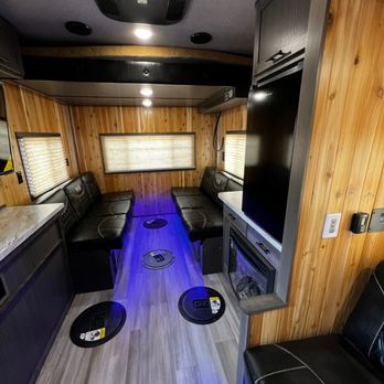 Absolute Trailer Sales - Yetti Fish House - Interior - Fireplace - queen bed - refrigerator - TV - Trailer Dealers Near Me - Inver Grove Heights, Minnesota Absolute Trailer Sales - Yetti Fish House - Interior - Fireplace - queen bed - refrigerator - TV - Trailer Dealers Near Me - Inver Grove Heights, Minnesota