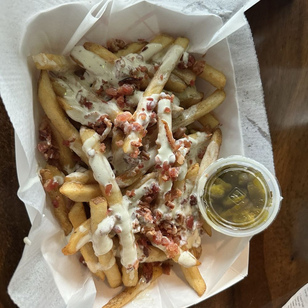 Hammered Cow - Loaded Bacon queso fries with jalapeños on the side - Burgers Near Me - Mobile, Alabama