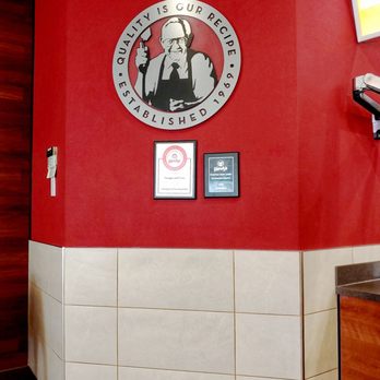 Wendy's - a red wall with a sign on it - Fast Food Near Me - Burlington, Kentucky Wendy's - a red wall with a sign on it - Fast Food Near Me - Burlington, Kentucky