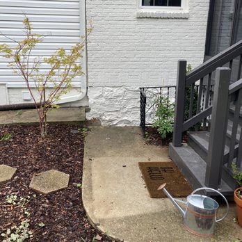 Nashscapes - a watering can on the ground in front of a house - Lawn Services Near Me Nashscapes - a watering can on the ground in front of a house - Lawn Services Near Me
