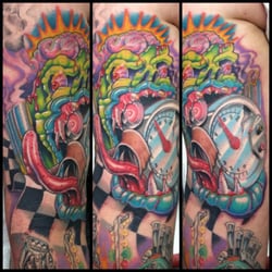 Custom artwork by Scott Junkins, owner of Trident Tattoo Company.