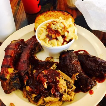 Spanx The Hog BBQ & Saloon - Really good sampler, which includes ribs, pulled pork and buffalo wings. - Barbeque Near Me - Pompano Beach, Florida Spanx The Hog BBQ & Saloon - Really good sampler, which includes ribs, pulled pork and buffalo wings. - Barbeque Near Me - Pompano Beach, Florida