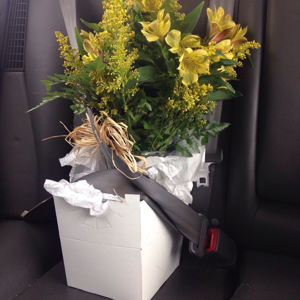 Melrose Floral - Flowers safely belted in by our lovely florist at Melrose! - Floral Designers Near Me - Omaha, Nebraska