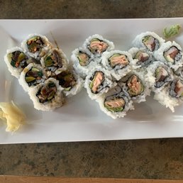 three pieces of sushi on a plate three pieces of sushi on a plate