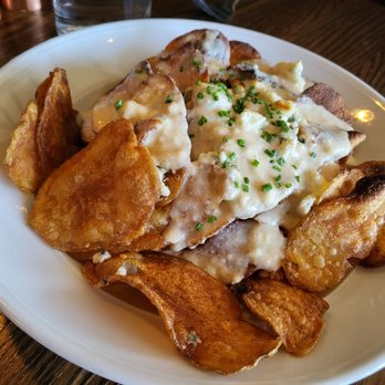 The Trap Rock Restaurant & Brewery - Fresh made chips with blue cheese sauce and crumbles, not to be missed - Bars Near Me - Berkeley Heights, New Jersey