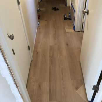 Cornerstone Floors - Here is a picture of the hallway in the middle of the installation - Flooring Near Me - Los Alamitos, California