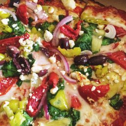 Greek pizza made to order.