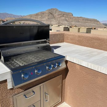 BBQ Concepts - The grill in open position. View of Lone Mountain from our rooftop deck. - Grilling Equipment Near Me - Las Vegas, Nevada BBQ Concepts - The grill in open position. View of Lone Mountain from our rooftop deck. - Grilling Equipment Near Me - Las Vegas, Nevada