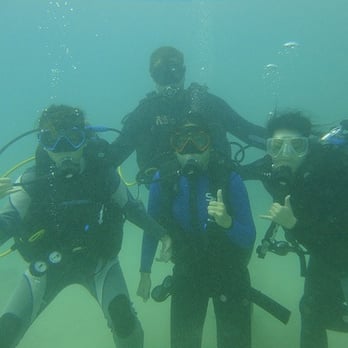 Rainbow Scuba Hawaii - A pic w/ our instructor Ken in tha back - Boating Near Me - Honolulu, Hawaii Rainbow Scuba Hawaii - A pic w/ our instructor Ken in tha back - Boating Near Me - Honolulu, Hawaii