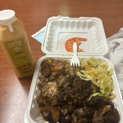 Sophia Home Style Cafe - The food was really good i loved the coconut rice n peas paired well with the oxtail also carrot punch 10/10