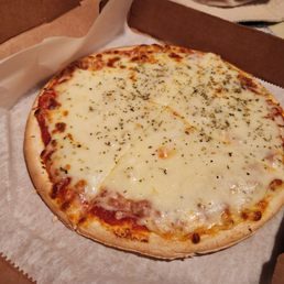 Cheese pizza. It's like those frozen mamma Celeste ones. Cheese pizza. It's like those frozen mamma Celeste ones.