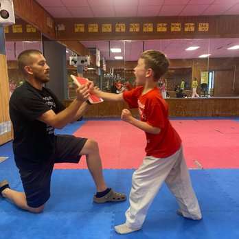 Dunedin Taekwondo Academy - The moment before the break is where discipline meets determination in Taekwondo. - Taekwondo Near Me - Dunedin, Florida Dunedin Taekwondo Academy - The moment before the break is where discipline meets determination in Taekwondo. - Taekwondo Near Me - Dunedin, Florida