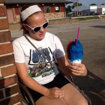 Wash Mo Snow - a young woman sitting on a chair - Shaved Ice Near Me - Washington, Missouri Wash Mo Snow - a young woman sitting on a chair - Shaved Ice Near Me - Washington, Missouri